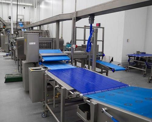 Quik Trip production line with blue food grade conveyor belt