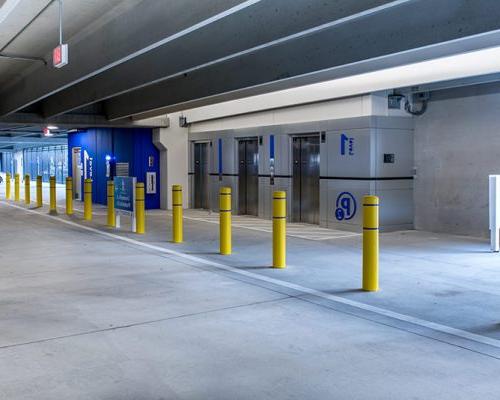 Photo of the elevators and signs within the Baptist Medical center parking structure